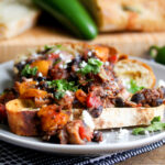 Southwestern black bean and tomato toasts