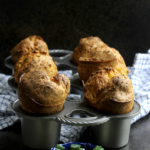 Chili, Cheddar, and Scallion Popovers with Aleppo Butter